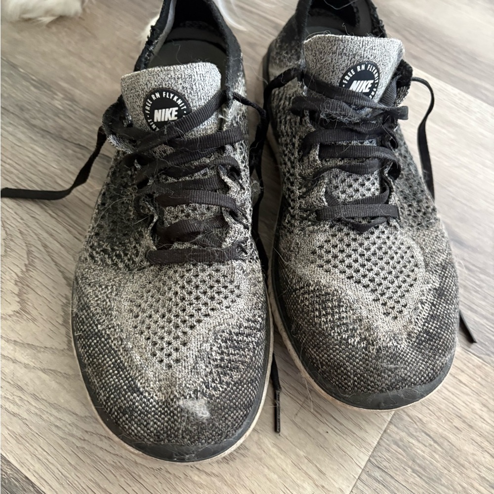 Nike women’s Gray and Black Athletic Shoes